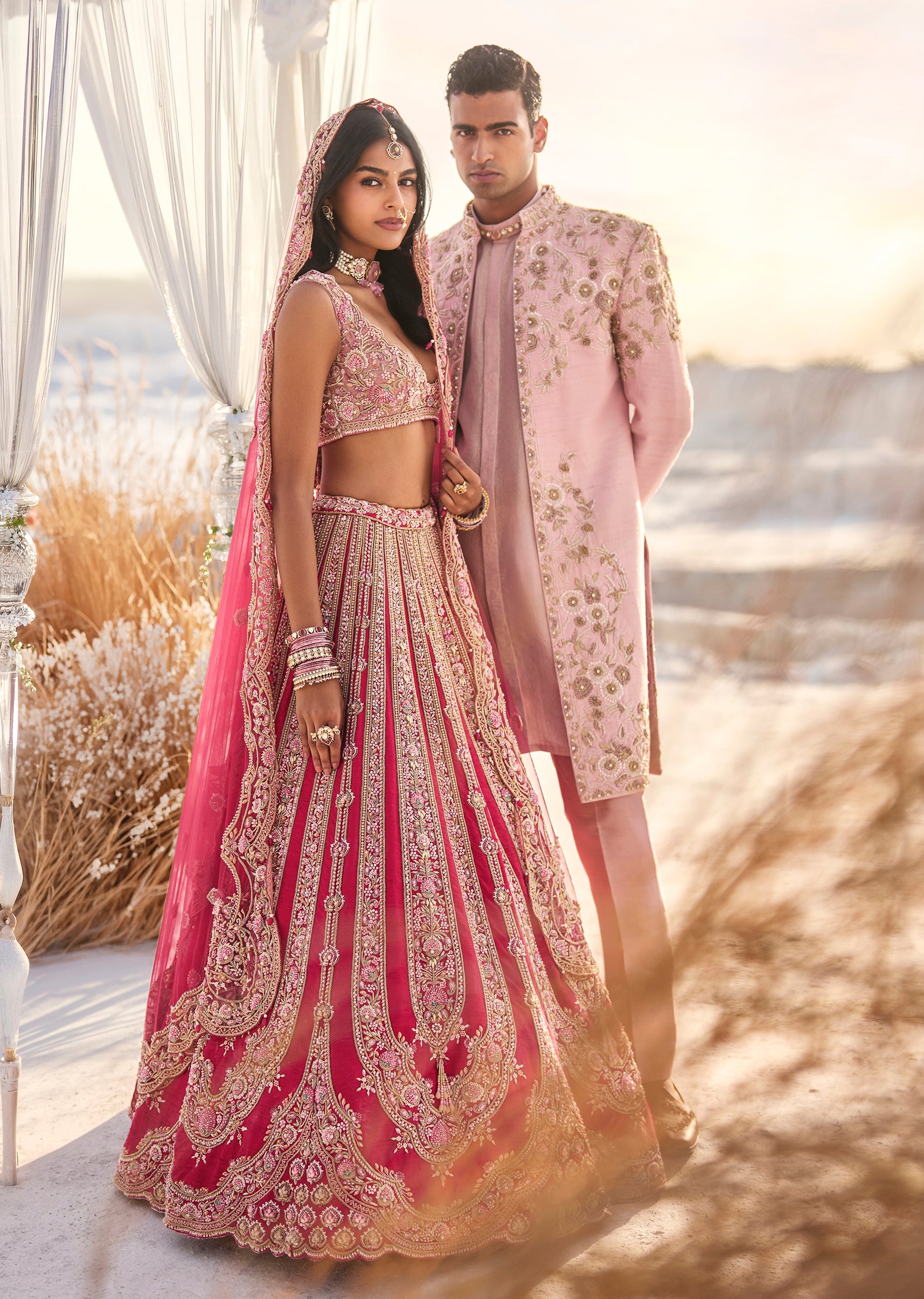 Pink Ceremonial Elegance - Bridal Lehenga For Her And Rich Hand Embroidered Sherwani For Him