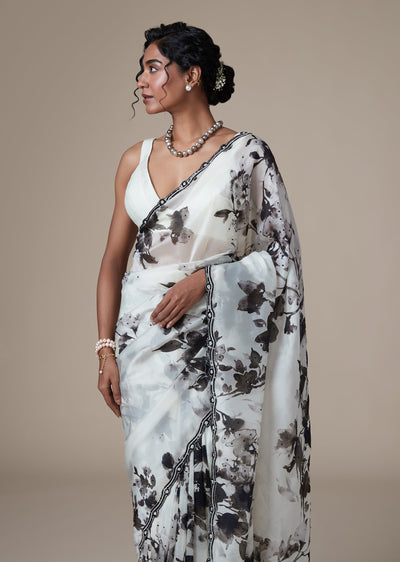 White Muslin Organza Saree With Floral Print And Cut Dana Embroidered Border