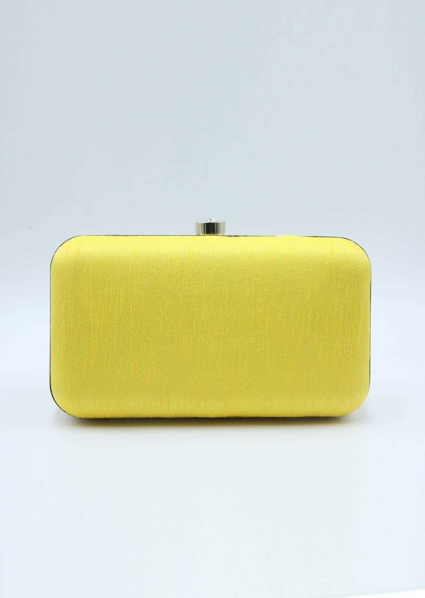 Yellow sling clutch bag embellished in zardosi floral embroidery 